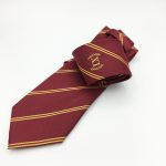 Custom made club neckties and custom made cufflinks with club logo