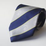 Custom striped club neckties with recurring logos, custom ties with club crests woven in club colors