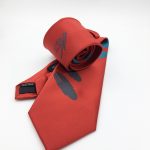Tailor made necktie with logo we made in a custom necktie design for the hospitality industry