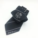 Personalised necktie with a logo and text and custom made cufflinks in a personalised design